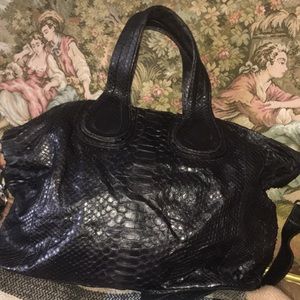 Justified Hunter skin leather handbag